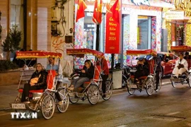 Turistas en Hanoi. (Fuente: VNA)