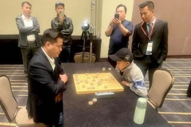 Jugador vietnamita defiende título mundial de ajedrez chino
