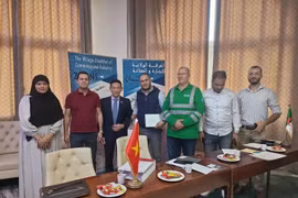 Panorama del encuentro entre representantes vietnamitas y argelinos. (Fuente: VNA)