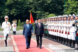 [Foto] Inicia primer ministro de Laos visita oficial a Vietnam