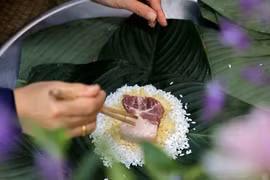 Elaboración de Banh chung - singularidad de cultura tradicional vietnamita