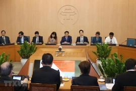 Exploran empresarios singapurenses oportunidades de cooperación en Hanoi