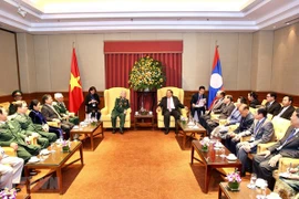 Se reúne máximo dirigente de Laos con exsoldados voluntarios vietnamitas