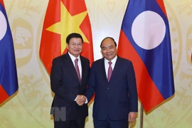 Crean nueva fuerza de impulso para profundizar lazos Vietnam- Laos 