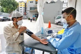 Singapur impulsa medidas contra el COVID-19 ante riesgo de perder control de epidemia