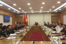 Médicos militares de Vietnam e India comparten experiencias en control el COVID-19