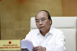 Premier de Vietnam exige mantener en alto la vigilancia ante compleja evolución del COVID-19