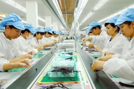 Reajuste de tasas de cambio busca estabilizar macroeconomía en Vietnam