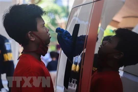 Indonesia despliega fuerza policial para garantizar cumplimiento de medidas contra el COVID- 19