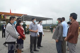Provincias vietnamitas y laosianas mejoran coordinación en lucha contra el COVID-19