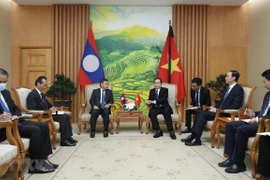 Corroboran cooperación entre alianzas político-sociales de Vietnam y Laos 