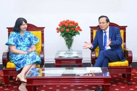 Sesión de trabajo entre el ministro de Trabajo, Inválidos de Guerra y Asuntos Sociales de Vietnam, Dao Ngoc Dung y la embajada de Rumania en Vietnam, Cristina Romila (Foto: Vietnam+) 
