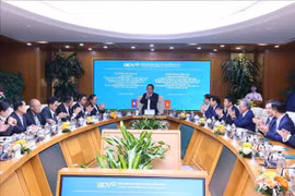 En la sesión de trabajo entre la delegación laosiana y BIDV (Fuente: VNA)