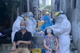 Premier dirige establecimiento de línea directa 019 - No COVID de Vietnam