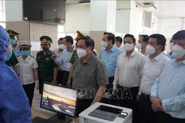 Premier insta a reforzar control del COVID-19 en Tay Ninh y Long An