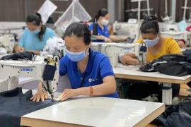 COVID-19: Millones de trabajadores vietnamitas poseen asistencia financiera