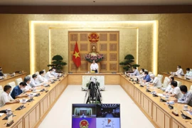Primer ministro de Vietnam destaca papel de científicos y médicos en lucha contra el COVID-19