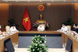 Vicepremier de Vietnam recibe a empresas donantes a fondo nacional de vacunación contra COVID-19 