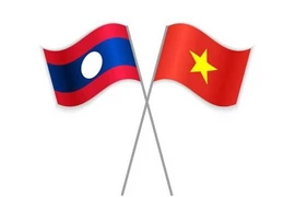 Embajada laosiana en Singapur felicita a su similar vietnamita en ocasión del Tet