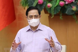 Premier vietnamita insta a controlar y repeler el COVID-19 en áreas clave 