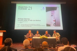 Efectúan en Hanoi programa dedicado al arte fotográfico