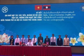Buscan promover cooperación económica entre Hanoi y localidades laosianas