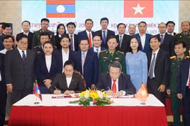 Localidades vietnamita y laosiana fomenten cooperación fronteriza