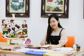 Desarrolla artista vietnamita arte del collage de telas