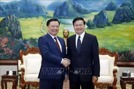 Presidente de Laos aprecia cooperación entre Hanoi y Vientiane