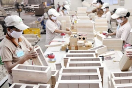 Ayudan a empresas madereras de Vietnam a expandir negocio en UE