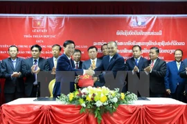  Vietnam y Laos fomentan cooperación en propaganda y educación