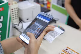 COVID-19 impulsa mercado de billeteras electrónicas en Vietnam