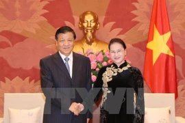 La presidenta de la Asamblea Nacional de Vietnam, Nguyen Thi Kim Ngan, y el miembro permanente del Buró Político y secretario del Secretariado del Partido Comunista de China, Liu Yunshan