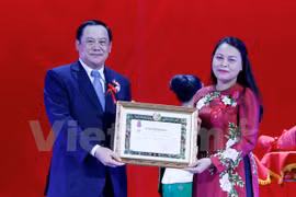 Uniones de Mujeres de Vietnam y Laos se esfuerzan por ampliar cooperación binacional 