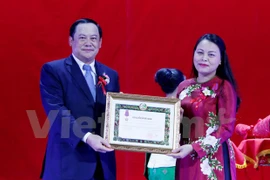 Uniones de Mujeres de Vietnam y Laos se esfuerzan por ampliar cooperación binacional 