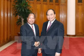 Premier vietnamita exhorta a mayor cooperación con Laos en seguridad pública 