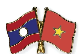 Vietnam y Laos refuerzan cooperación en ciencias sociales