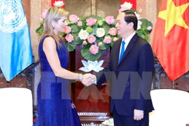 El presidente de Vietnam, Tran Dai Quang, (D) recibe en Hanoi a la Reina de Países Bajos, Máxima Zorreguieta Cerruti