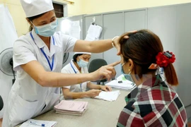 Vietnam por garantizar el 95 por ciento de la población con acceso al seguro de salud