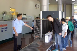 Vietnam y China buscan fortalecer gestión de divisas en comercio transfronterizo