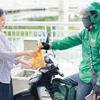 Las compras en línea se han convertido en un hábito de consumo para millones de familias vietnamitas, especialmente en las grandes ciudades. (Foto: dautu.vn)