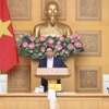 El primer ministro vietnamita, Pham Minh Chinh, interviene en la reunión. (Fuente: VNA)