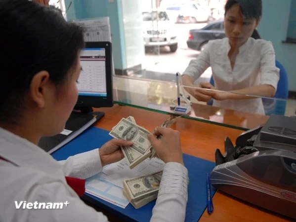 El tipo de cambio del dólar cotizado por los bancos ha aumentado continuamente durante las últimas dos semanas, con un 4,3% desde principios de año. (Foto: Vietnam+) 