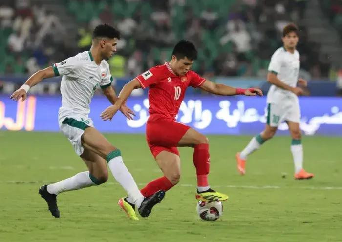 Una jugada en el partido entre Vietnam e Iraq. (Foto: VNA)