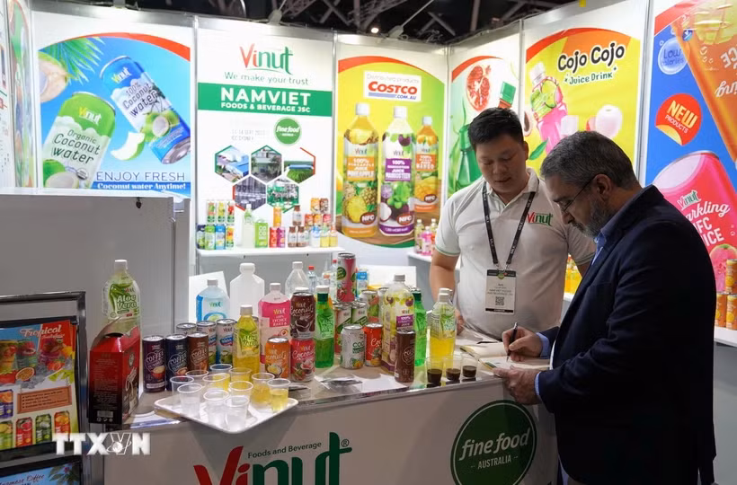 Visitantes en el pabellón vietnamita en una feria (Fuente:VNA)