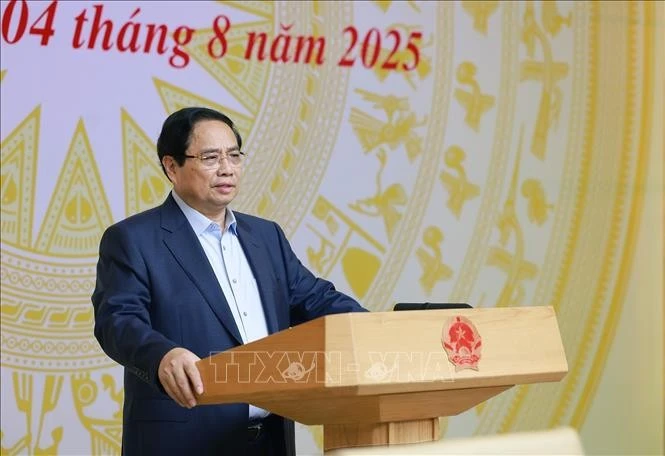 El primer ministro de Vietnam, Pham Minh Chinh, interviene en la reunión. (Foto: VNA)