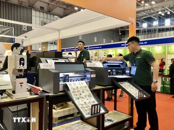 Presentan productos en la feria internacional especializada en tecnología de envasado, bebidas, plásticos y caucho. (Fuente: VNA) 