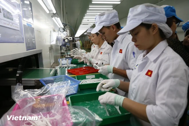 Muchas empresas se han convertido en proveedores de primer nivel de corporaciones multinacionales. (Foto: VNA)