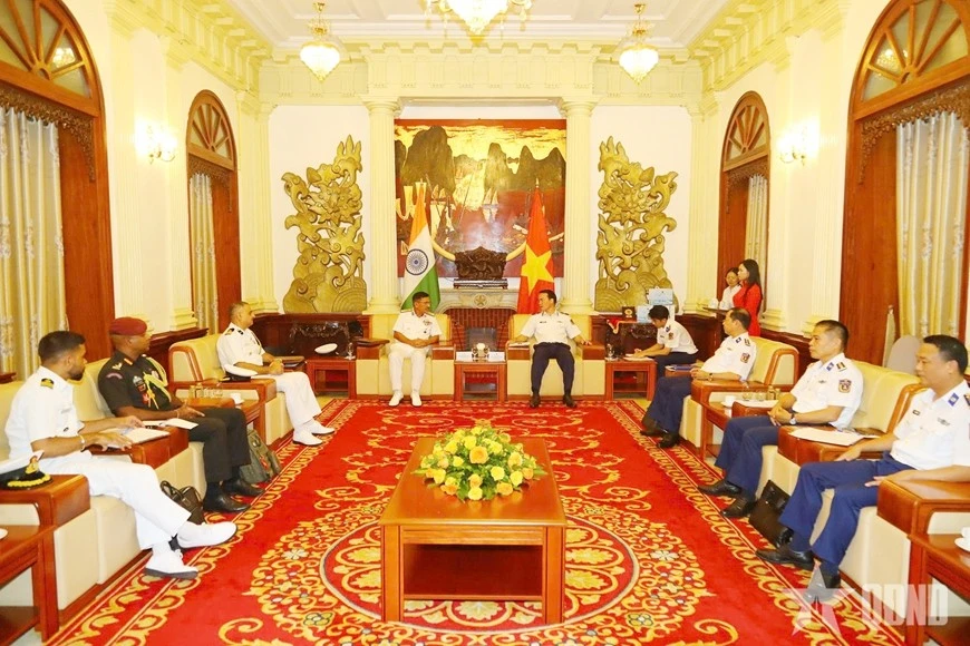En la reunión. (Foto: qdnd.vn)