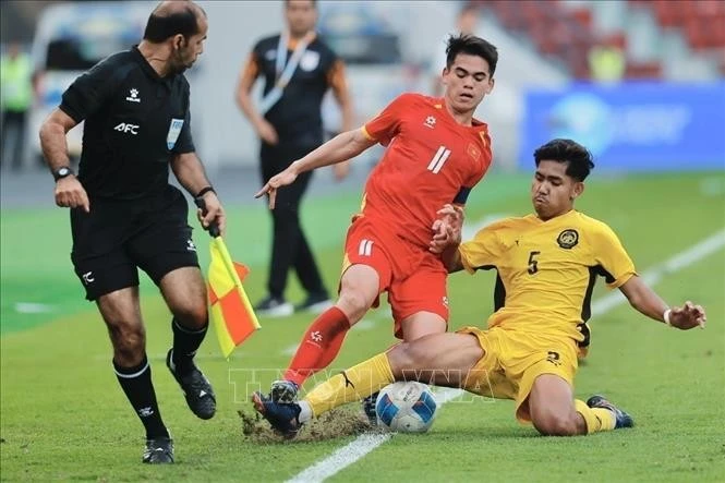 Selección de fútbol de Vietnam asegura su pase a semifinales. (Foto: VNA)